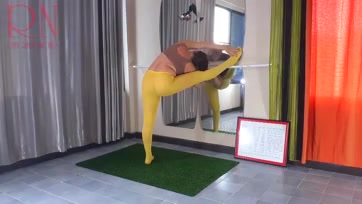 Regina Noir. Yoga in yellow tights doing yoga in the gym. 4
